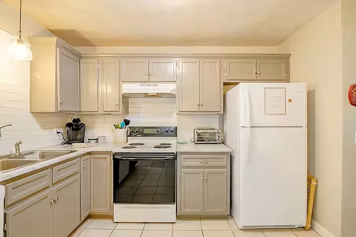 Fully-equipped kitchen has refrigerator, dishwasher, stove/oven, toaster oven, microwave oven, drip coffee maker and keurig coffee maker as well as ample dishes, silverware, glassware, pots, pans and baking items.