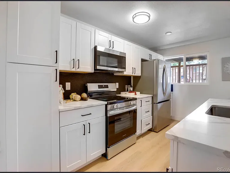5551 S Delaware St — Photo 7