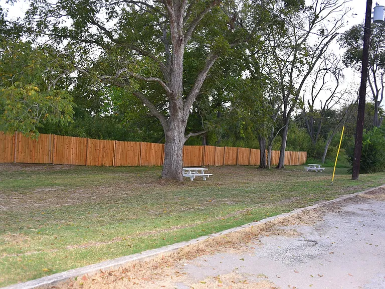 Besides your backyard, there is also shared yard space. Notice the big pecan tree in the center.