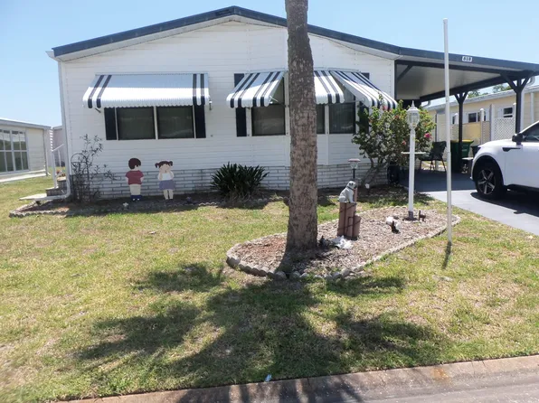 618 Bougainvillea Cir, Barefoot Bay, FL 32976