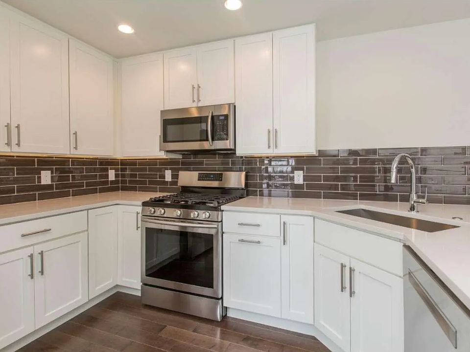 Kitchen with gas stove and full size dishwasher