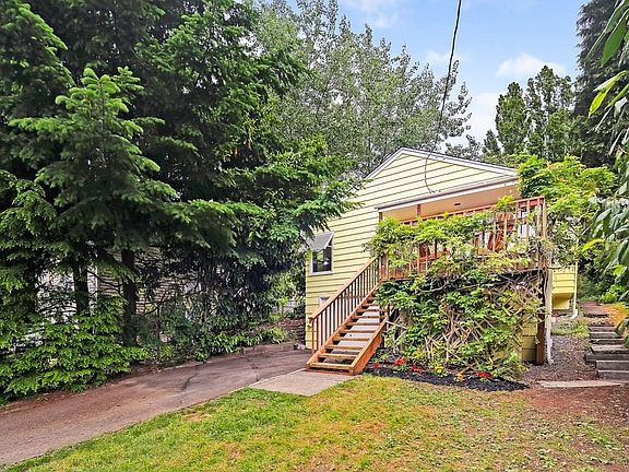 There is gardening space and a variety of Evergreen and fruit trees on the property.