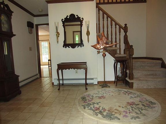 Foyer with Kitchen Hallway to Left