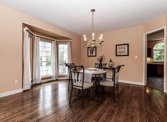 Grand formal dining room with bay window