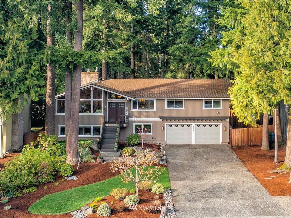 Long Driveway leads to Large Home Set Back from the Street