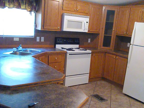 Kitchen + Oven + Microwave + Refrigerator