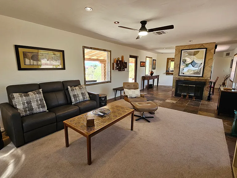 Power reclining sofa and leather lounge chair.