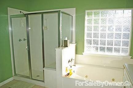 Master Bath
						:
						Separate walk-in shower and Jacuzzi-style tub