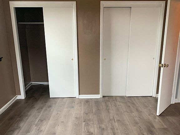 Bedroom with walk in closets
