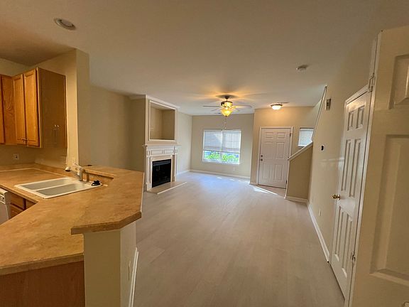 Living Room and Kitchen from entrance to master bedroom.