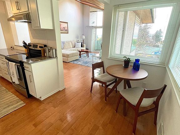 Sunny breakfast nook, or home office area.