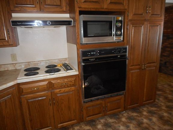 attractive kitchen with built ins