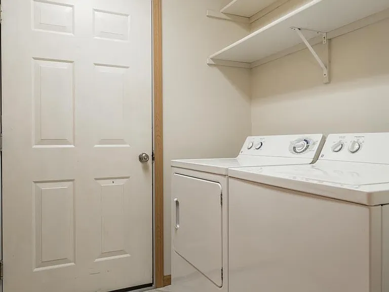 Make laundry day simple with an in-home washer and dryer just steps from the bedroom.