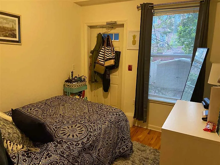 All bedrooms fit a double or queen-size bed. This bedroom has a private entrance to the back yard.