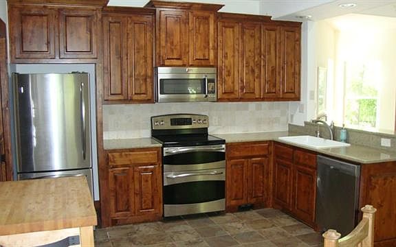 4th image of 6909 Red Bud Dr