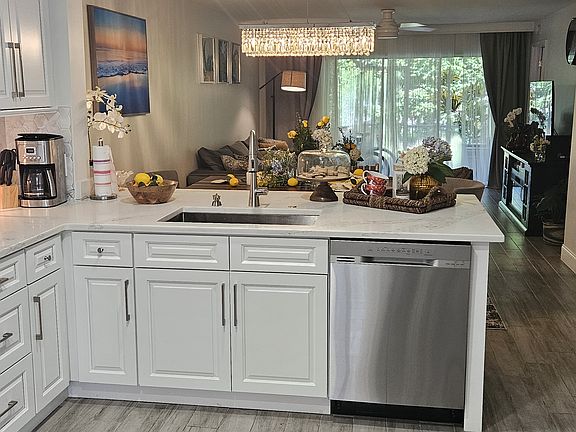 Fully equipped kitchen with stainless steel appliances for all your cooking needs