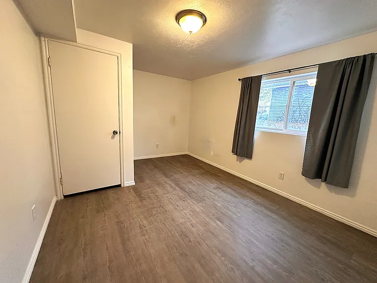 View of Downstairs Bedroom #4 Walk-in Closet & Large Window