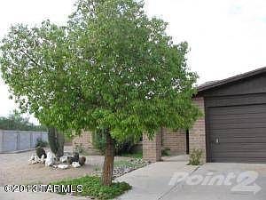Front tree and garage to NW
