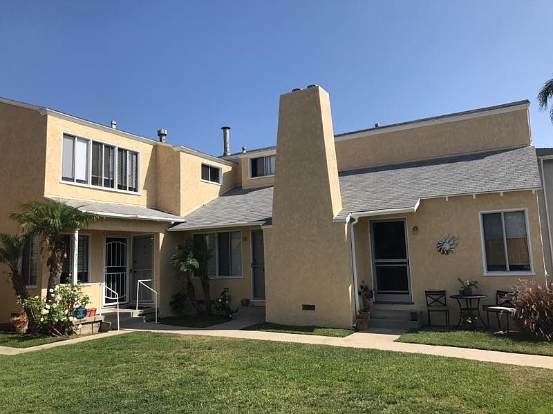Unit is upstairs on the left side of the photo