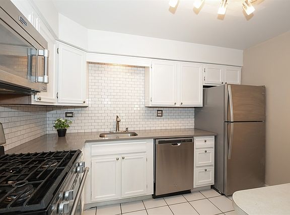5th image of 1250 Park Ave W APT 412
