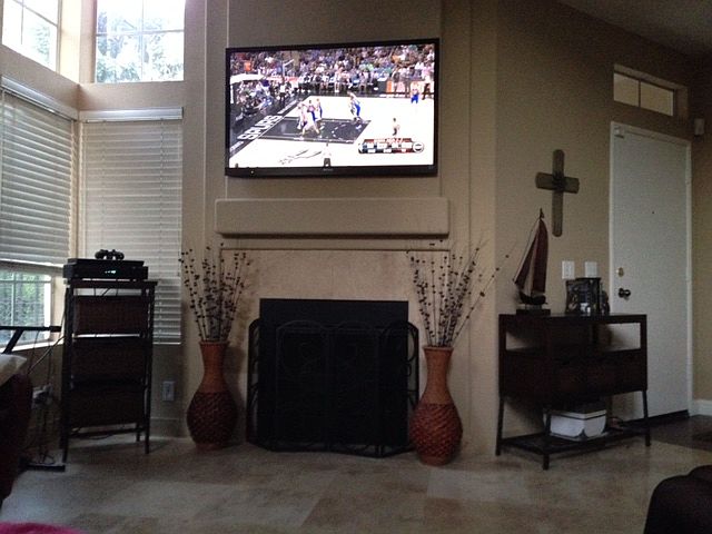 Travertine and hardwood. 