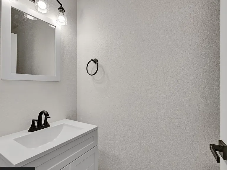 Main level half bathroom