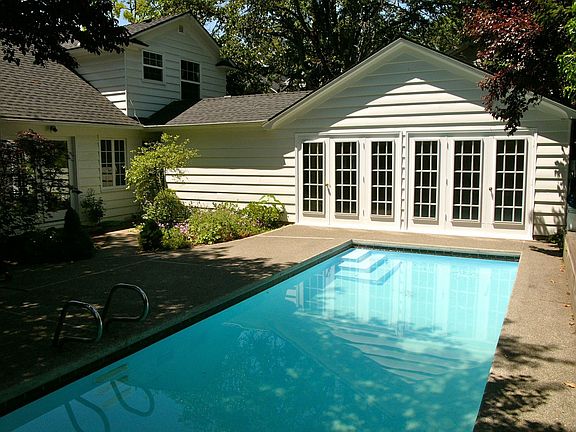 Pool with bedroom doors