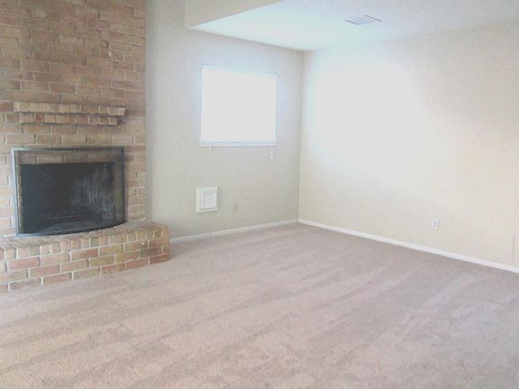 NICE DEN WITH FIREPLACE