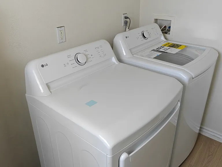 Laundry Room with New Washer and Dryer