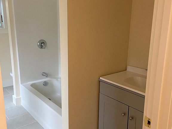 Full bath on kitchen level-all new.