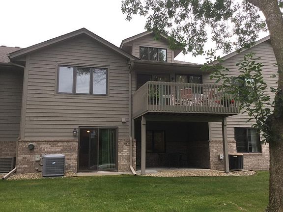 Walkout the back to a full yard and wooded view.  The walking path is steps away with nature abound.