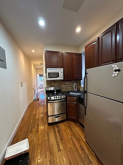 1st image of 114 E 1st St APT 24