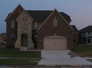 19336 Yukon River Dr, Macomb Township, MI 48042