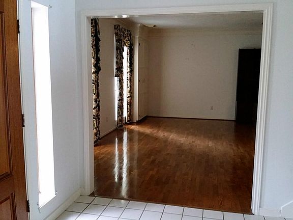 To the left of the Entry you will find the Formal Living Room.