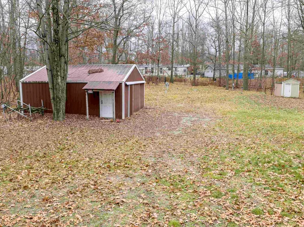 7737 Wilderness Dr, Weidman, MI 48893