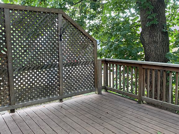 large deck overlooking backyard