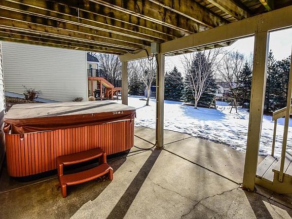 Covered Patio with hot tub.
