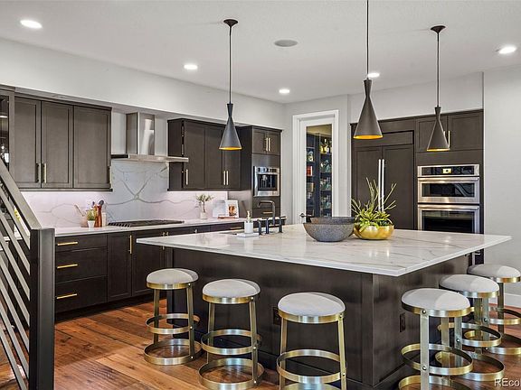 5th image of 9056 E 60th Avenue
