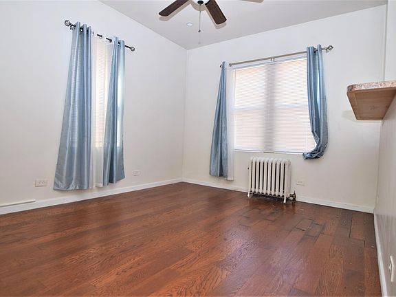 5th image of 938 E 212th St APT 1