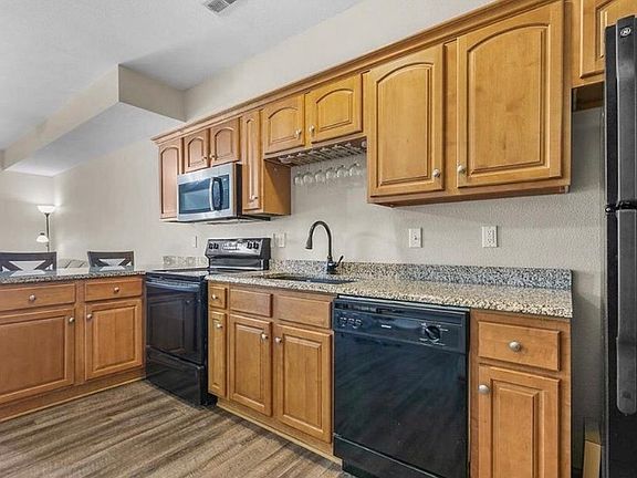 Kitchen includes granite counters, newer flooring and all appliances.