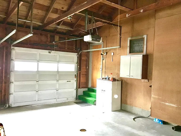 1.5 car garage with auto door opener.