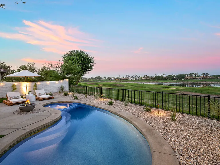 Staying cozy during chilly nights is made easy by the warmth of the fire pit.