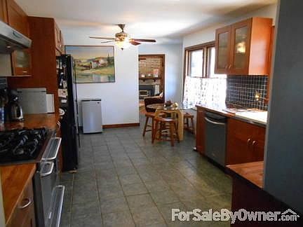 The Gathering Room -
						:
						Everyone congregates in the kitchen - here there is ROOM