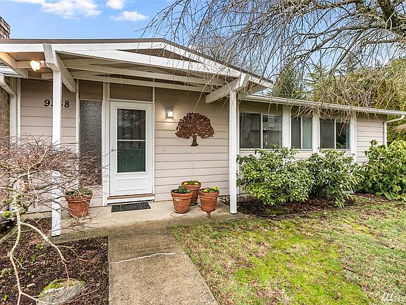 This charming covered front porch offers great curb appeal.