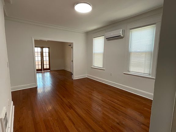 Living Room with view into Master Bedroom