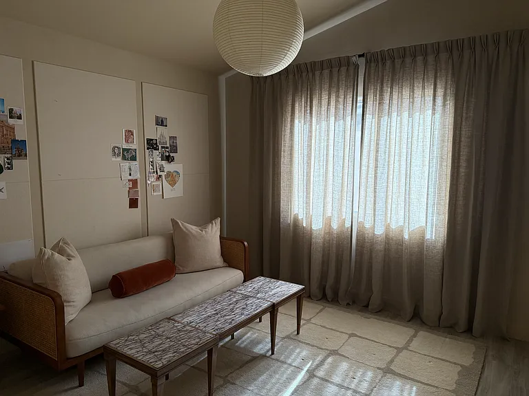 Versatile living space perfect for a sitting room, office, or bedroom.