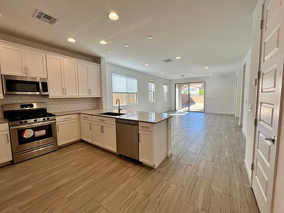 Kitchen, dining & great room
Photograph dated 2022. Updated version to be posted soon.