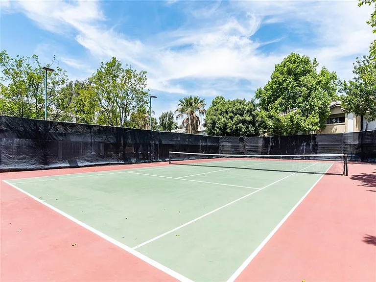 The Summit's on-site tennis court is a fantastic perk for residents who love to stay active, offering a well-maintained space to enjoy a friendly match or get in a great workout just steps from home.