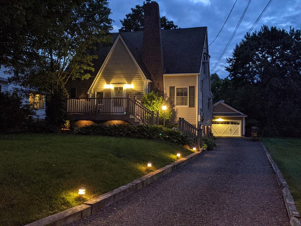 View looking from street at night. Tenant entrance is around the back of the house via their own exterior stairs.