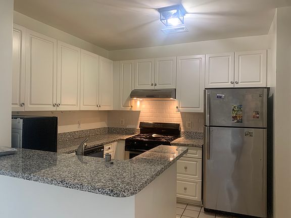 5th image of 7000 Falls Reach Dr APT 406